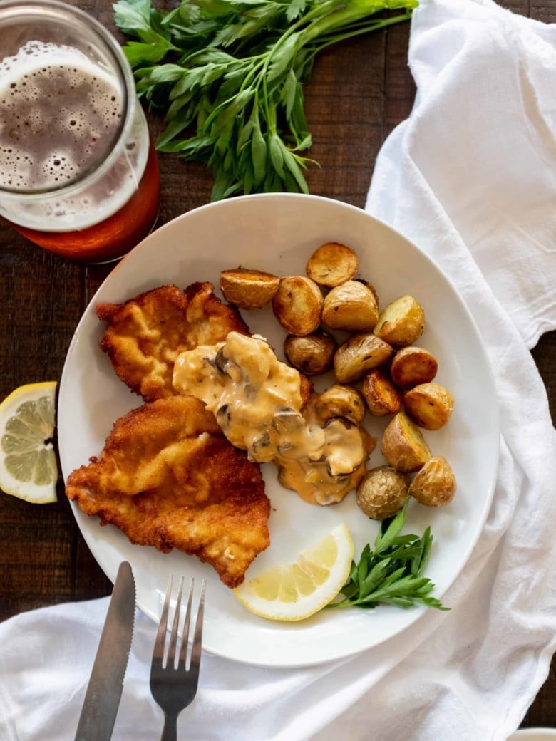 schnitzel with jaeger sauce and potatoes
