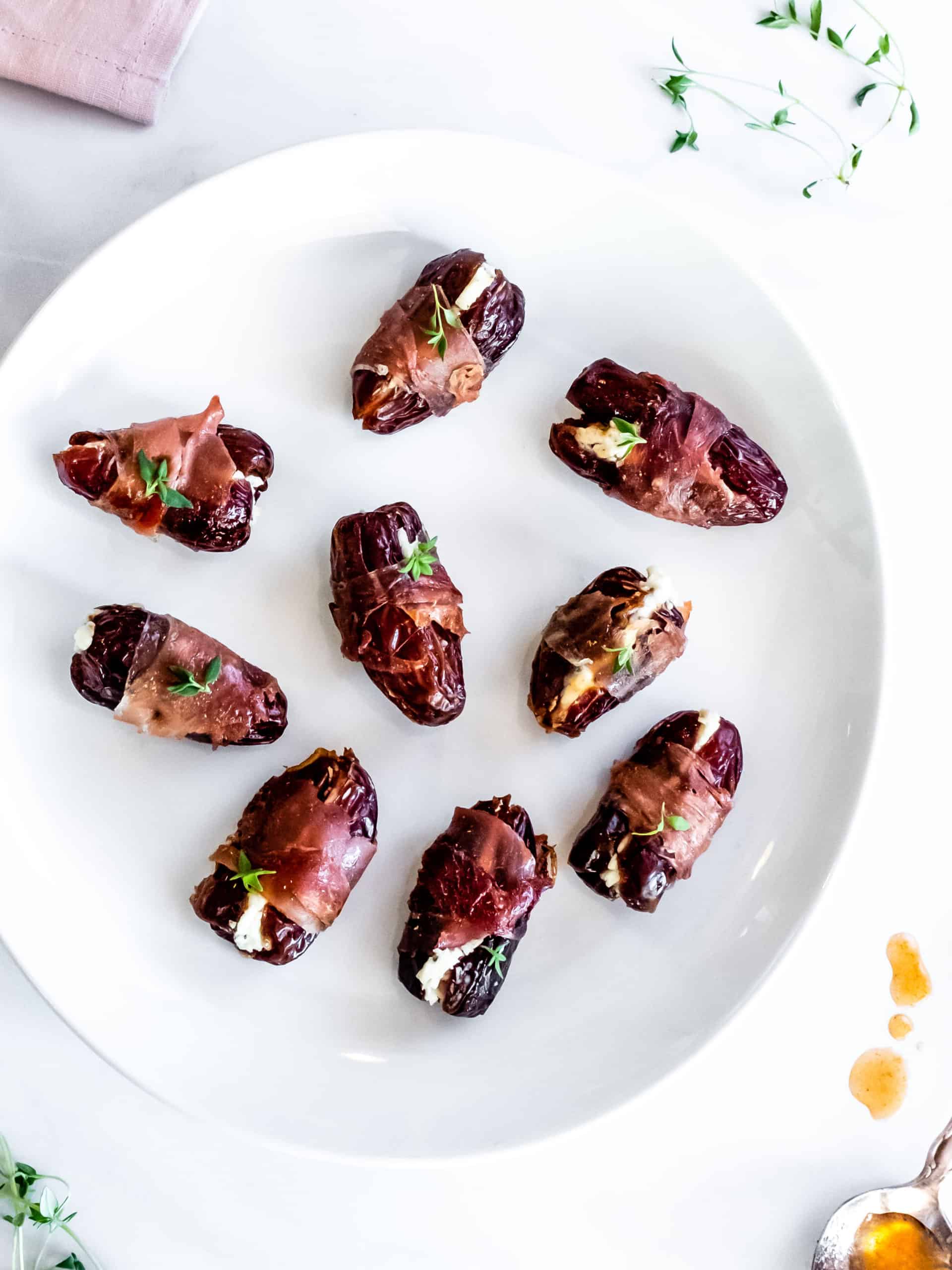 prosciutto wrapped dates with goat cheese with thyme