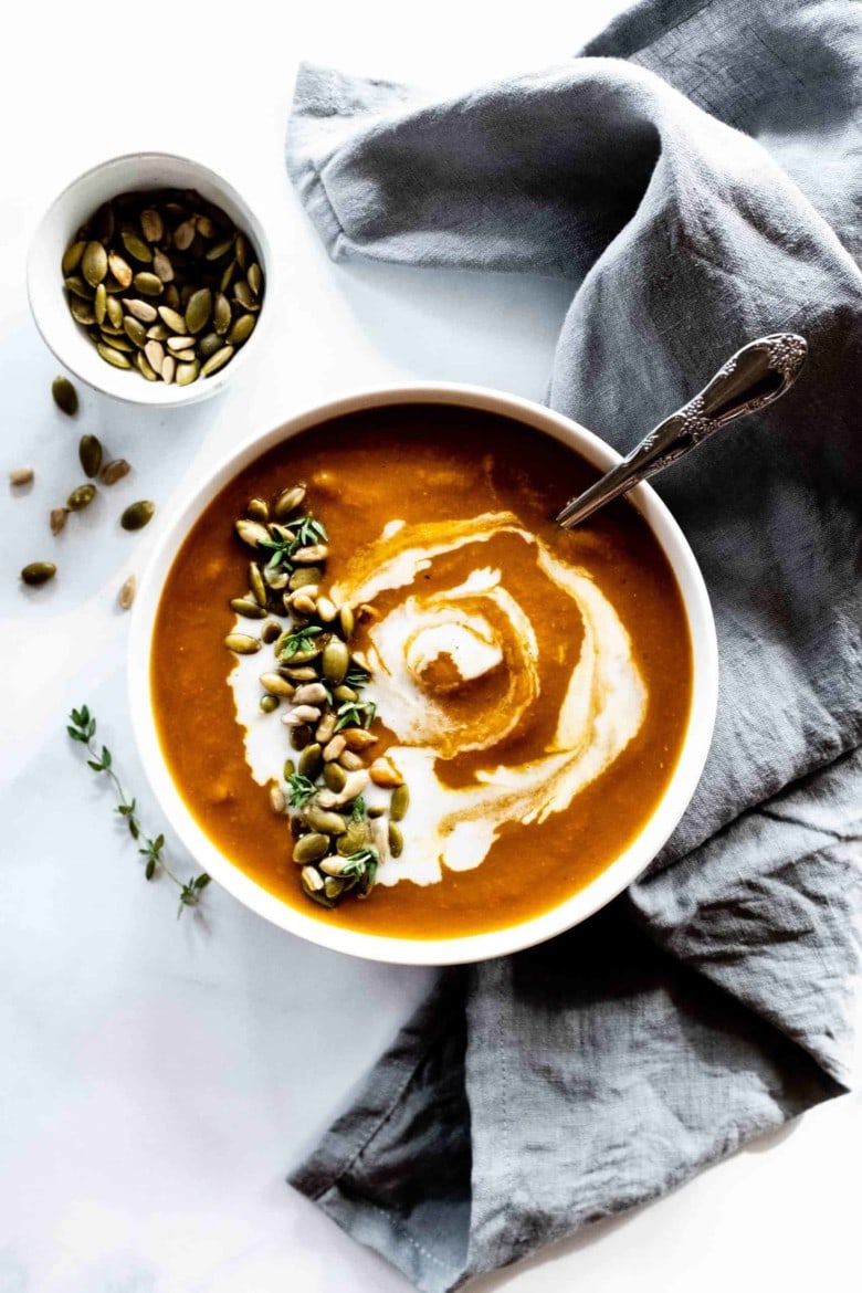 turmeric pumpkin soup with spoon