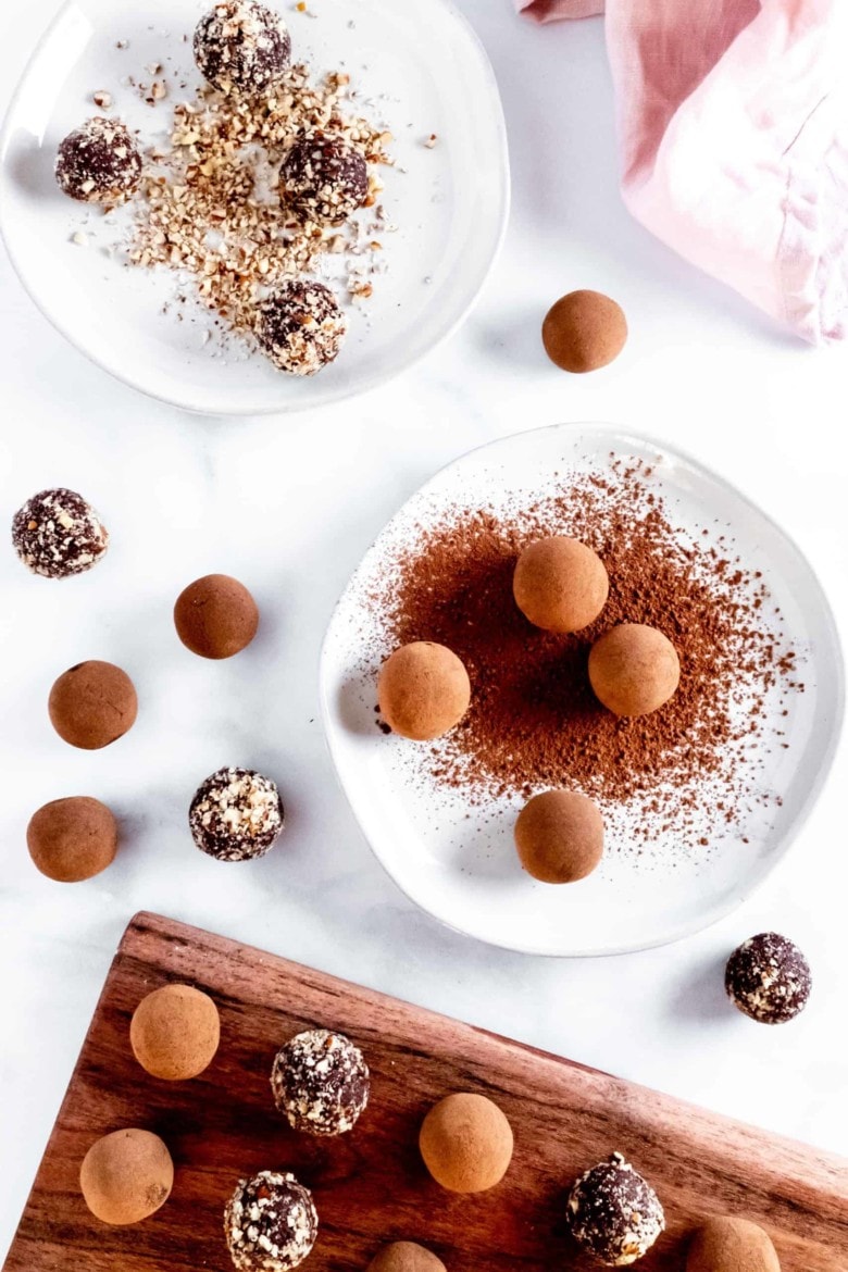 chocolate amaretto truffles rolled in nuts and cocoa powder