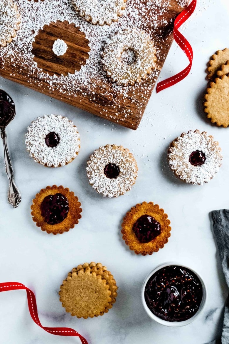 raspberry jam on linzer cookies