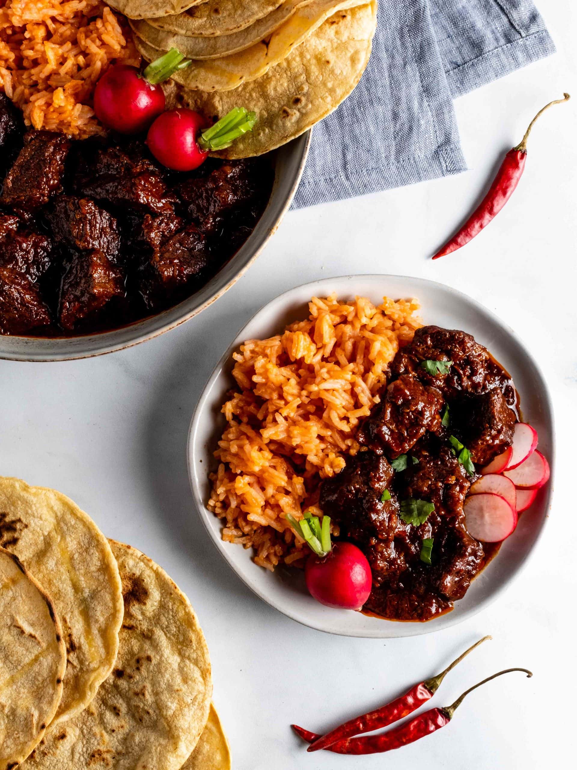 plate of chili colorado with rice