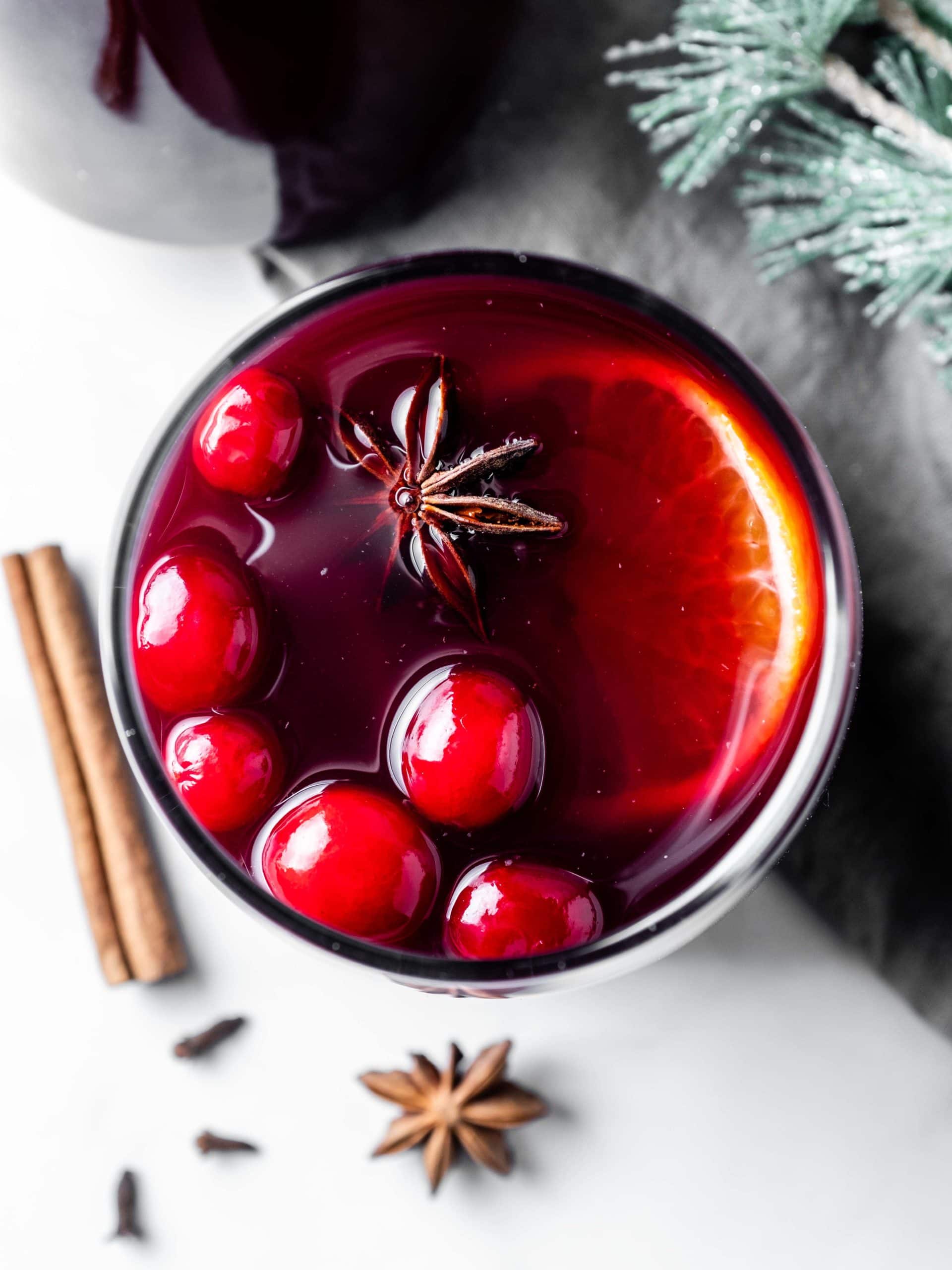 glass of mulled wine with cranberries