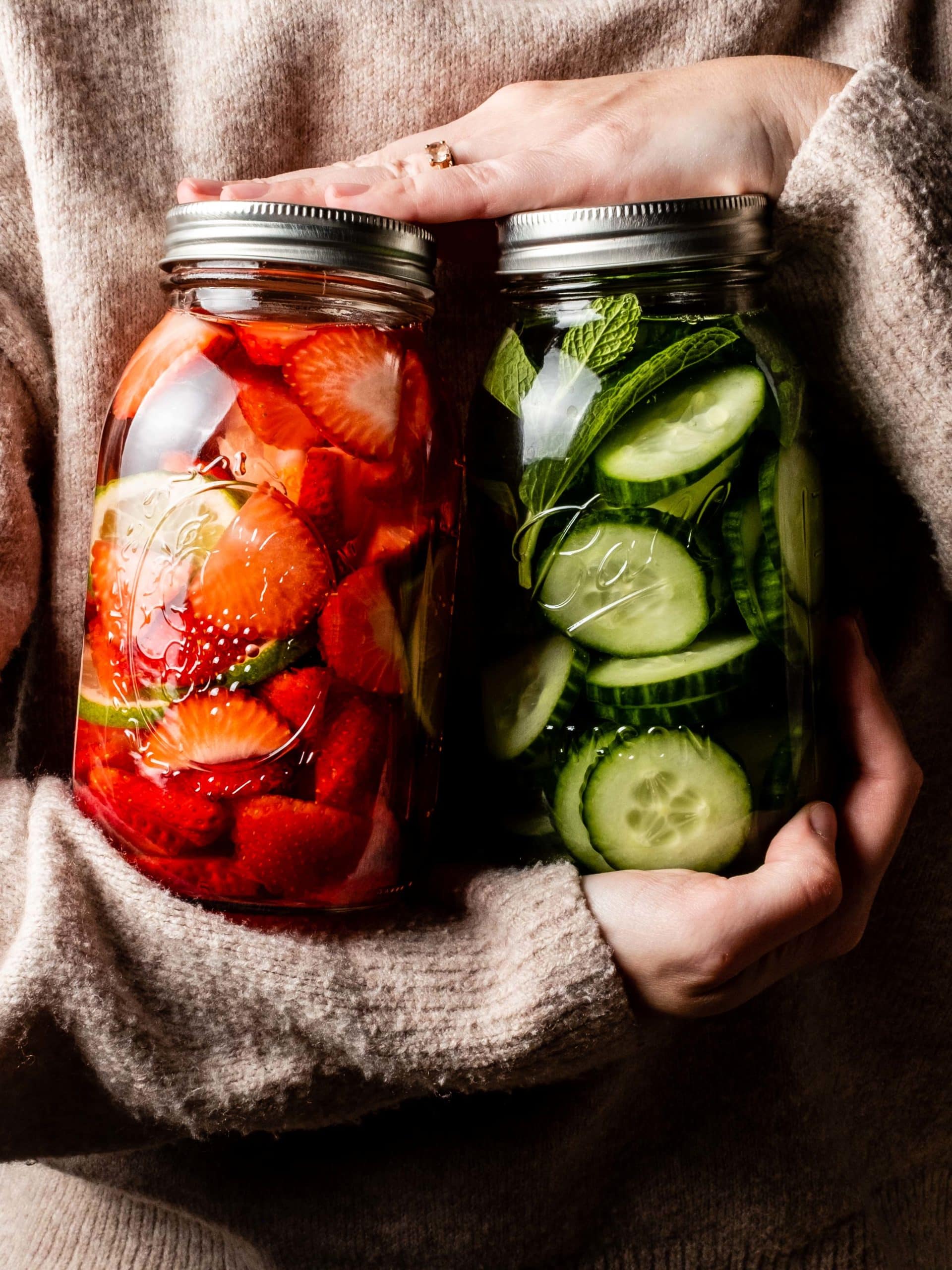 two jars of fruit infused vodka