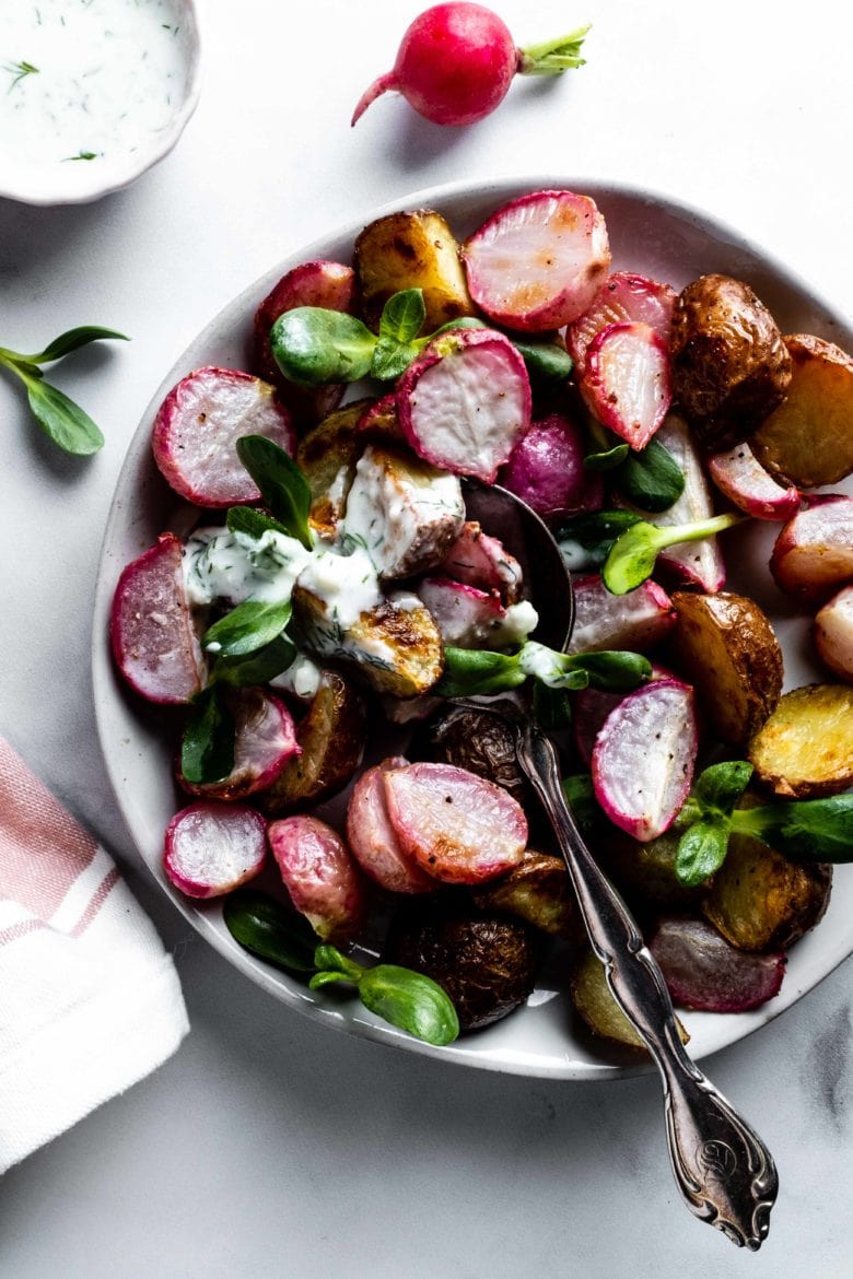 roasted radishes and potatoes topped with feta kefir dressing