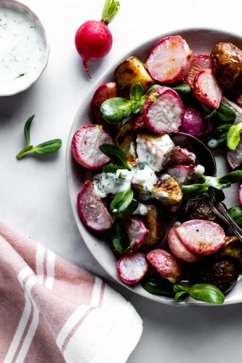 roasted radishes and potatoes topped with feta kefir dressing