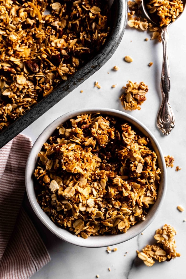 bowl of granola with pecans and popped amaranth