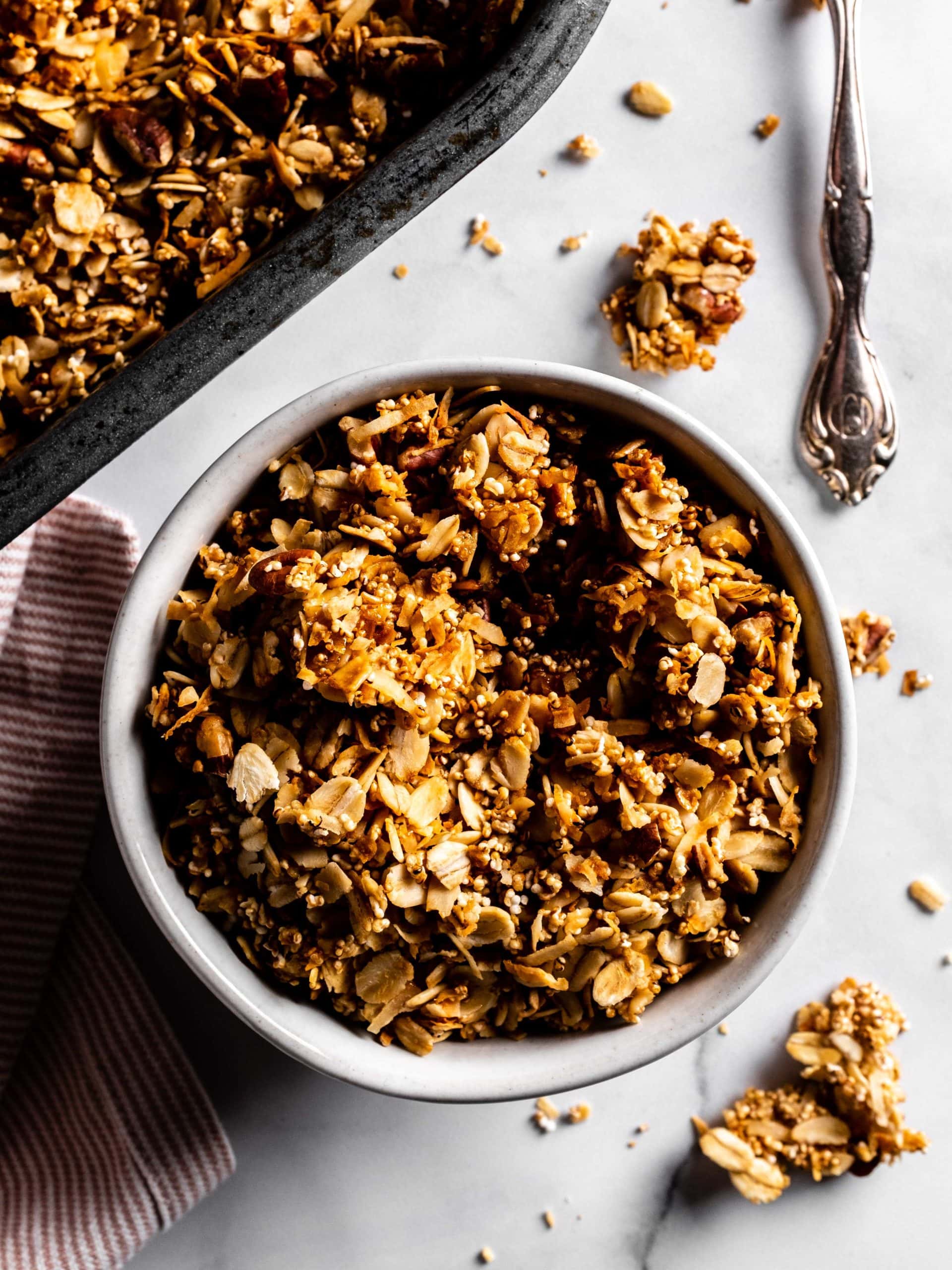 bowl of granola with pecans and popped amaranth