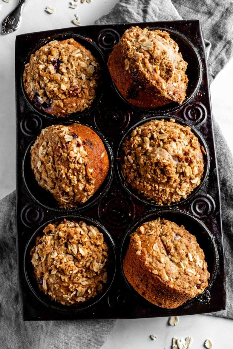 tin of baked blueberry muffins