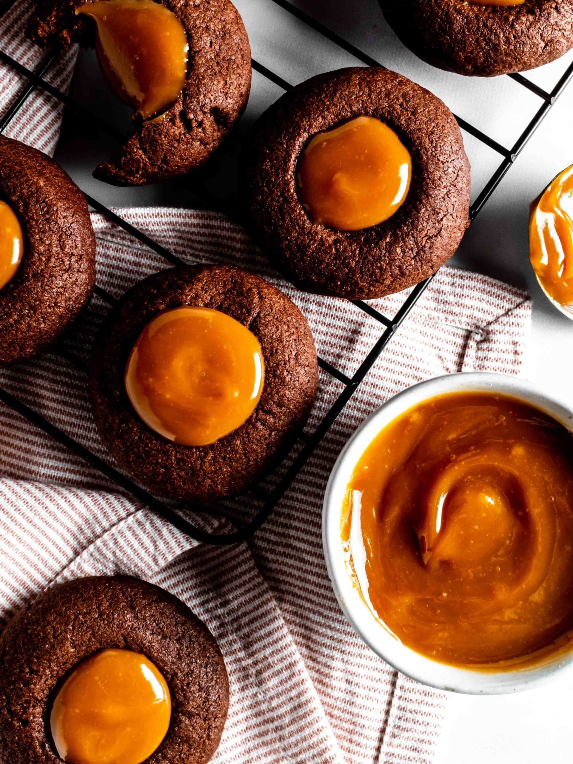 chocolate thumbprint cookies with bowl of dulce de leche