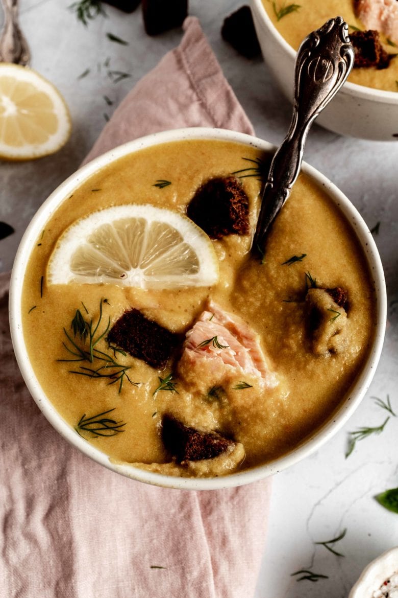 salmon soup with lemon, dill and croutons