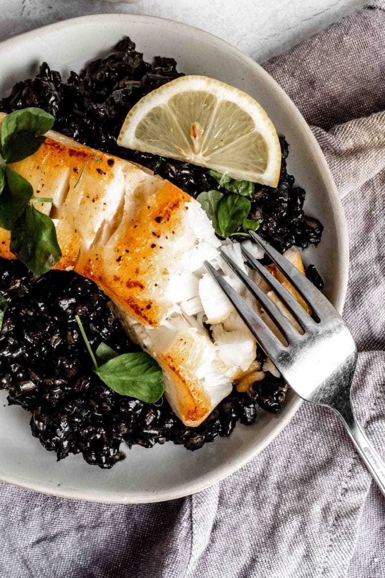 fork cutting into chilean sea bass