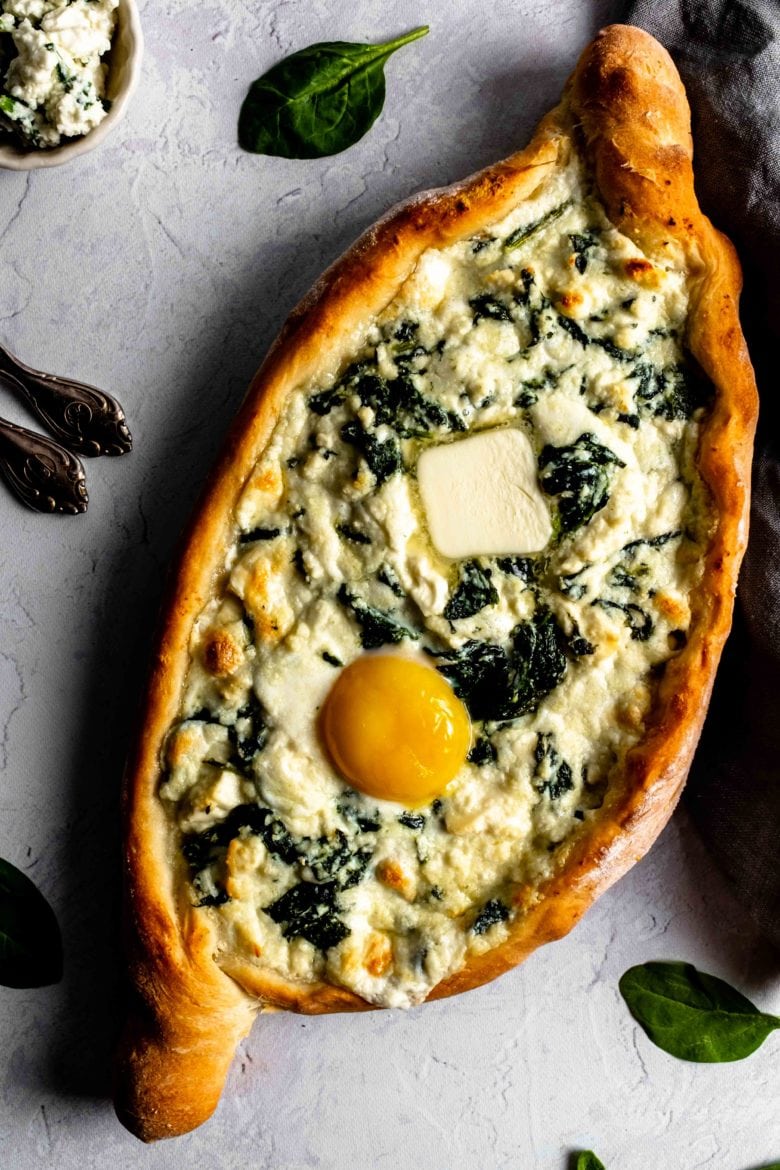 khachapuri with cheese, egg yolk and butter