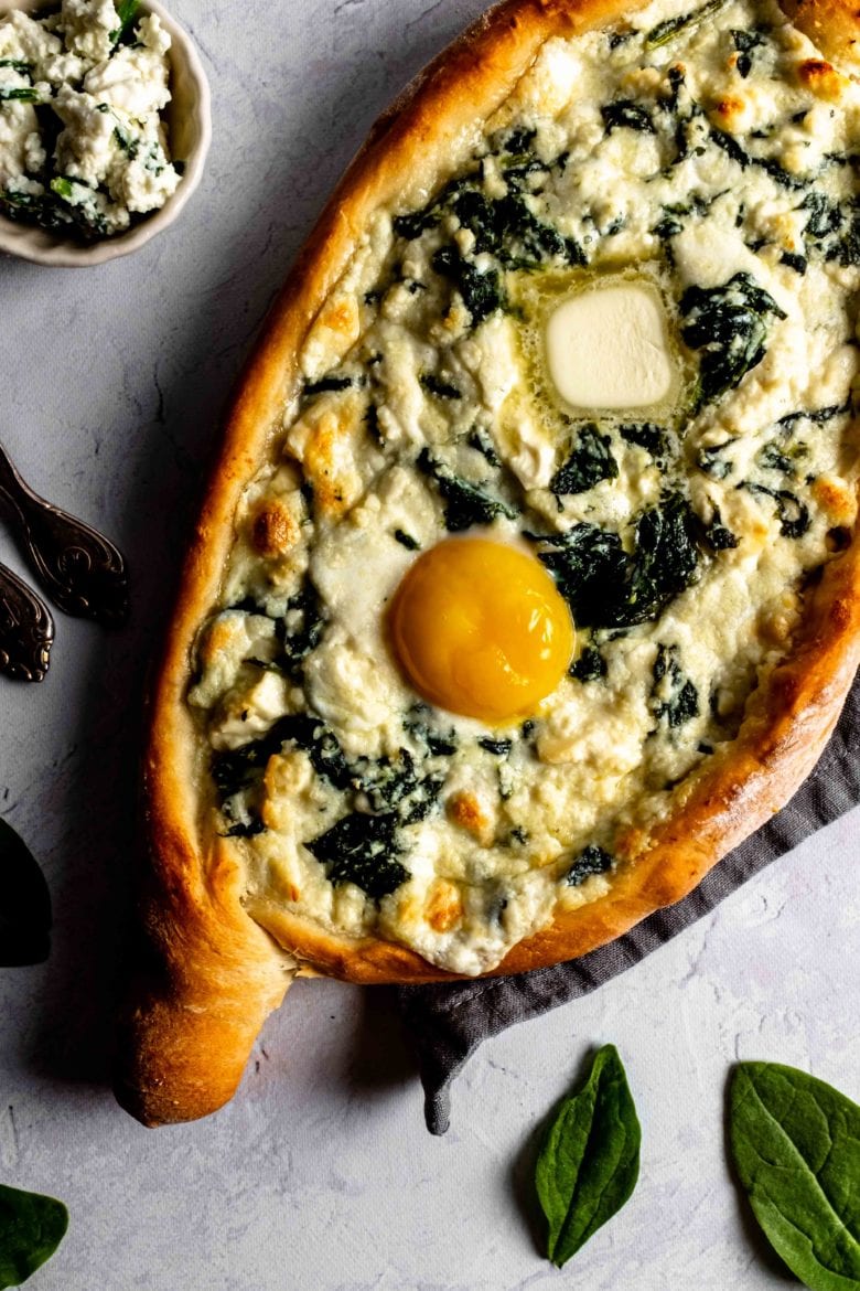 khachapuri with cheese, egg yolk and butter