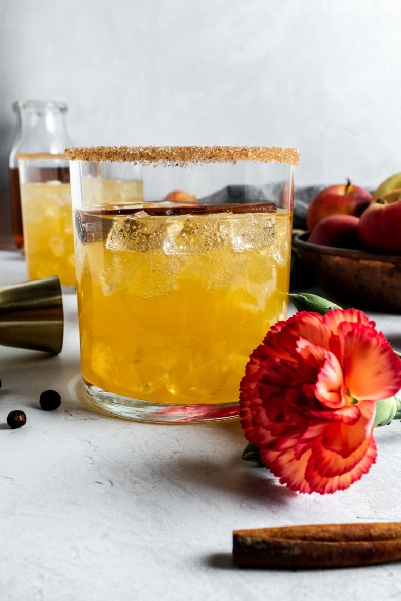 apple cider cocktail with cinnamon sugar rim