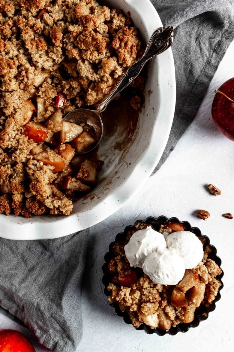 serving a portion of apple crisp