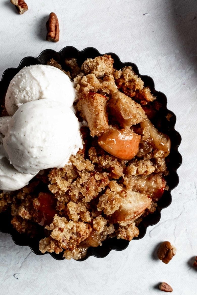 individual serving of apple crisp with ice cream