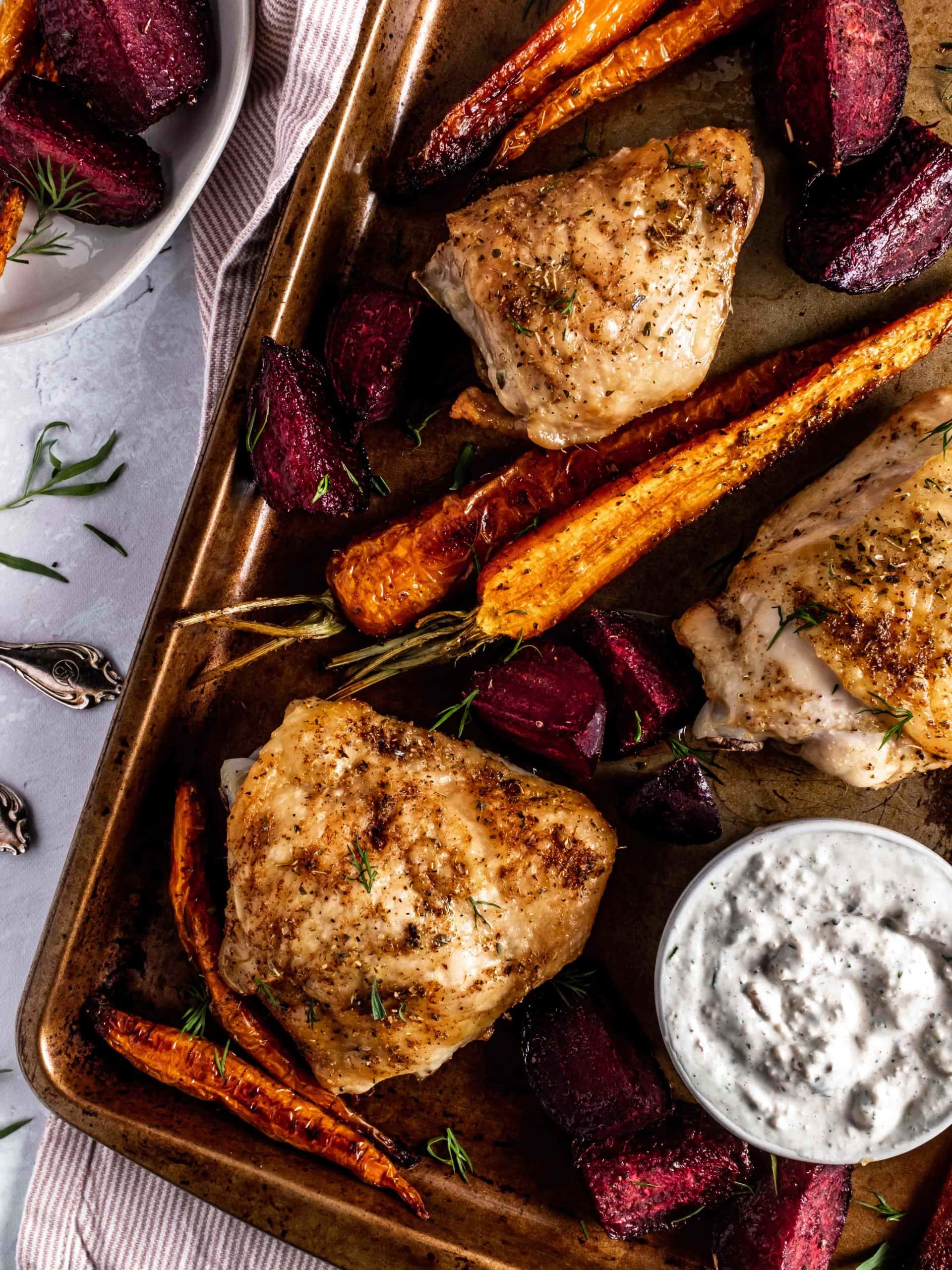 sheet pan with roasted chicken and veggies