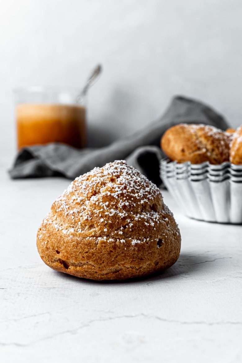 baked choux pastry sprinkled with powdered sugar