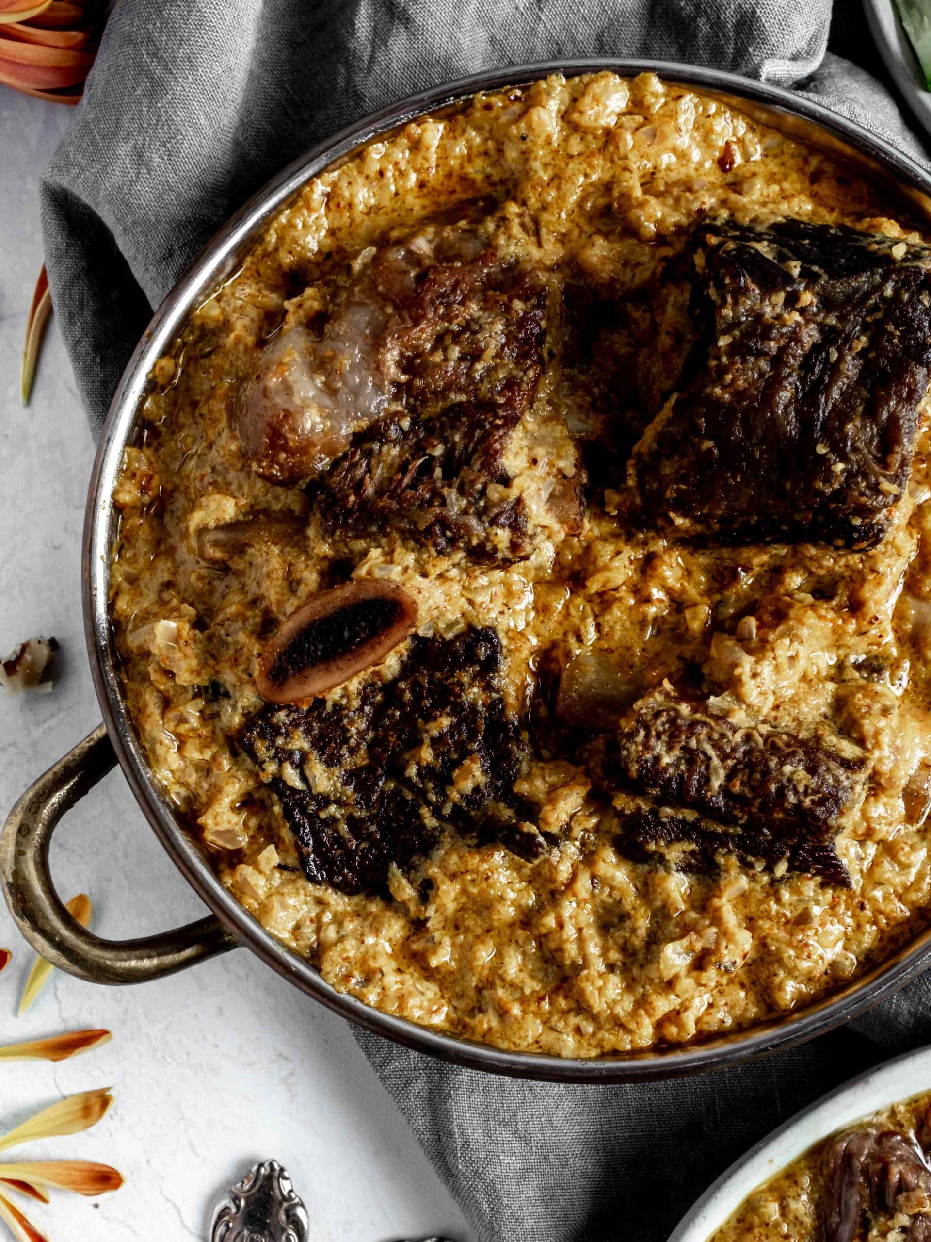 small pot of marigold braised beef and walnut stew