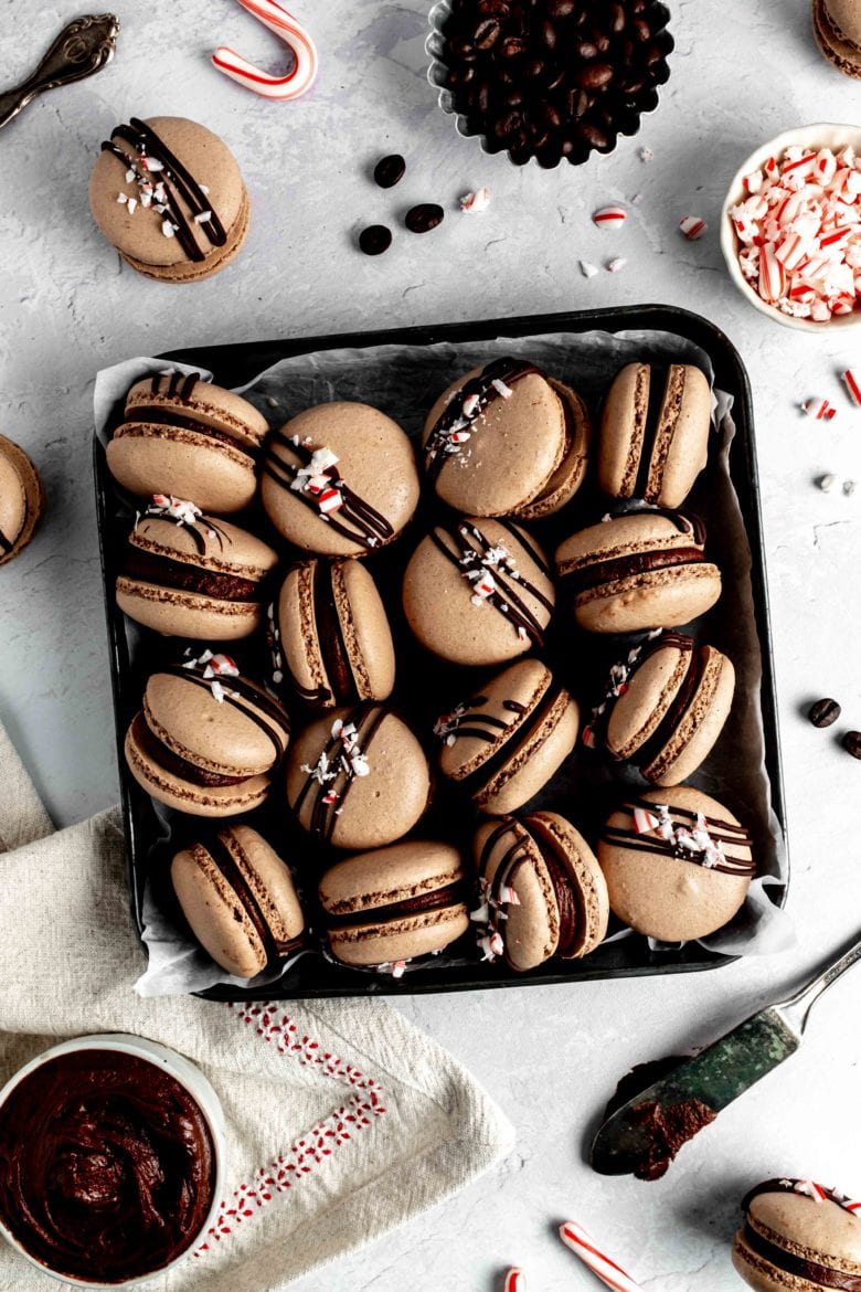 tin of macarons with crushed peppermint