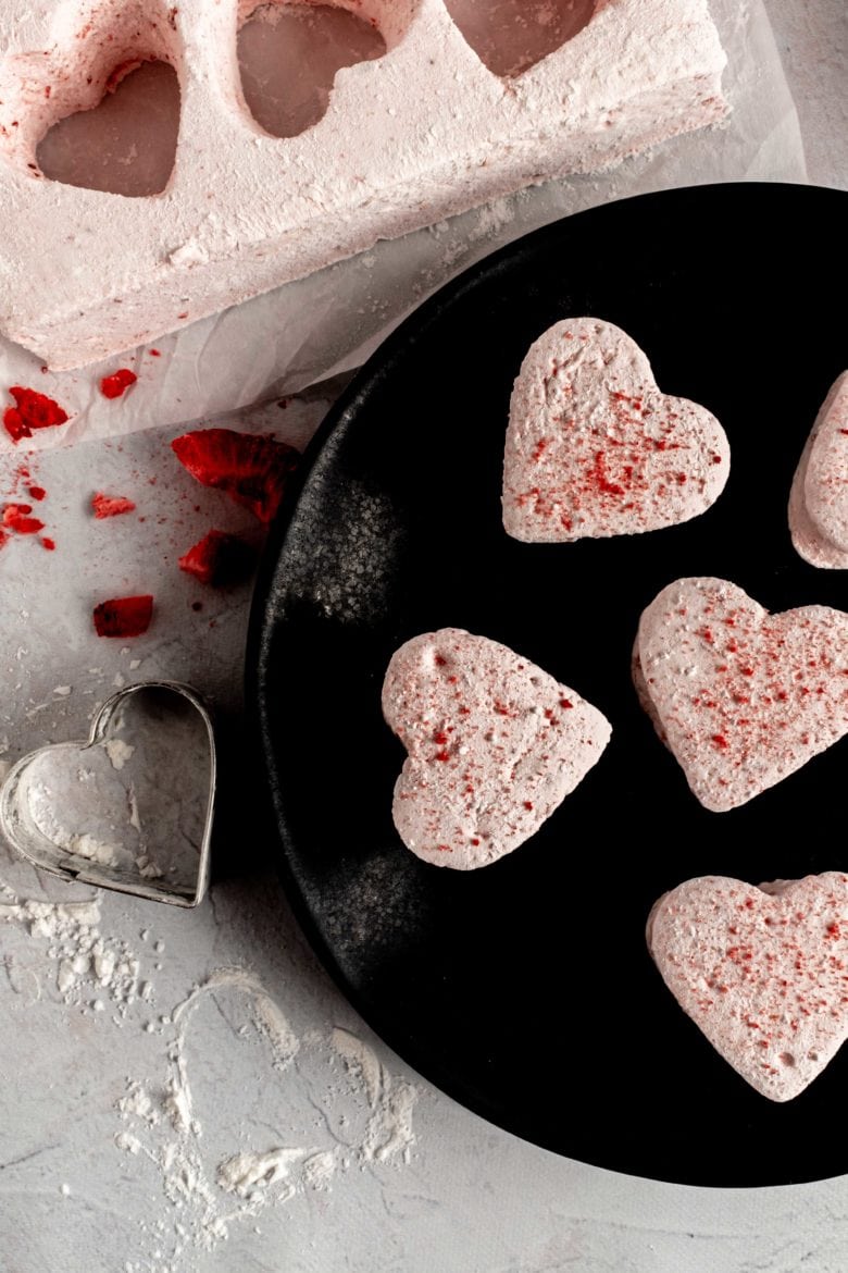 plate of heart marshmallows with freeze dried strawberries