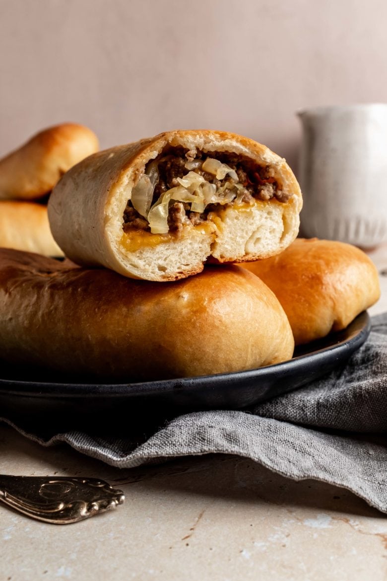 runza cut in half showing beef and cabbage mixture