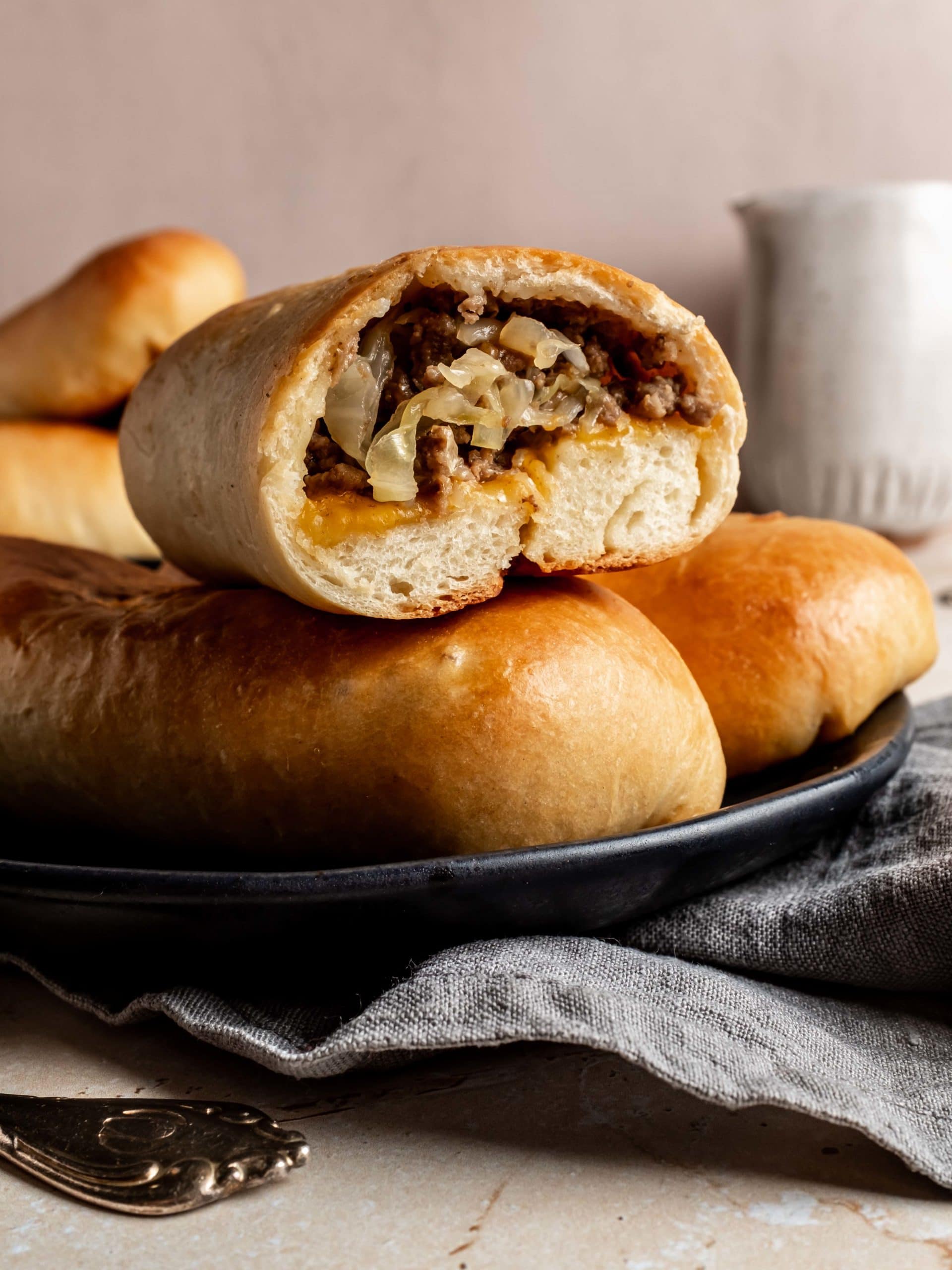 runza cut in half showing beef and cabbage mixture