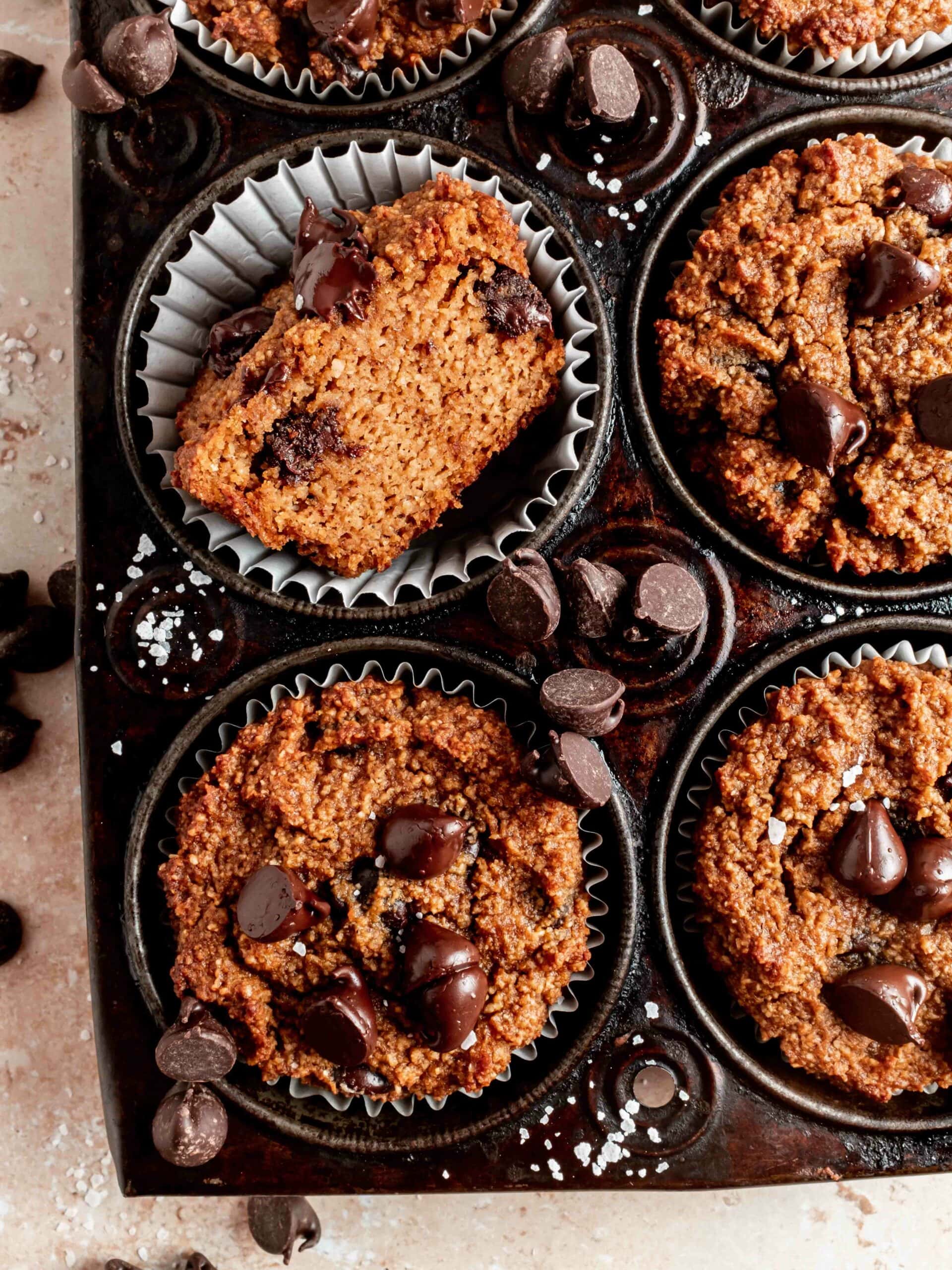 almond flour pumpkin muffins in tin with chocolate chips