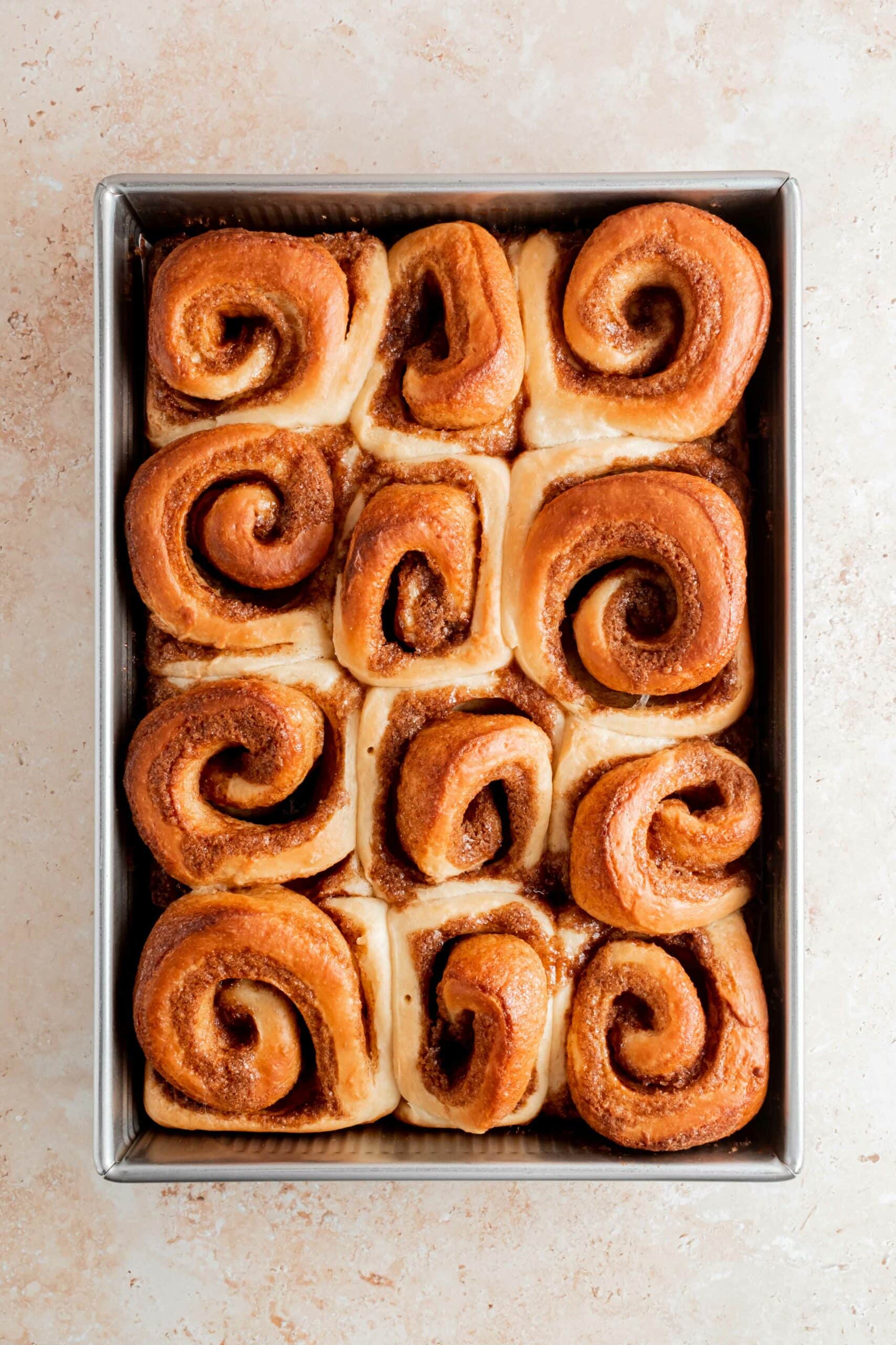 baked cinnamon rolls in pan