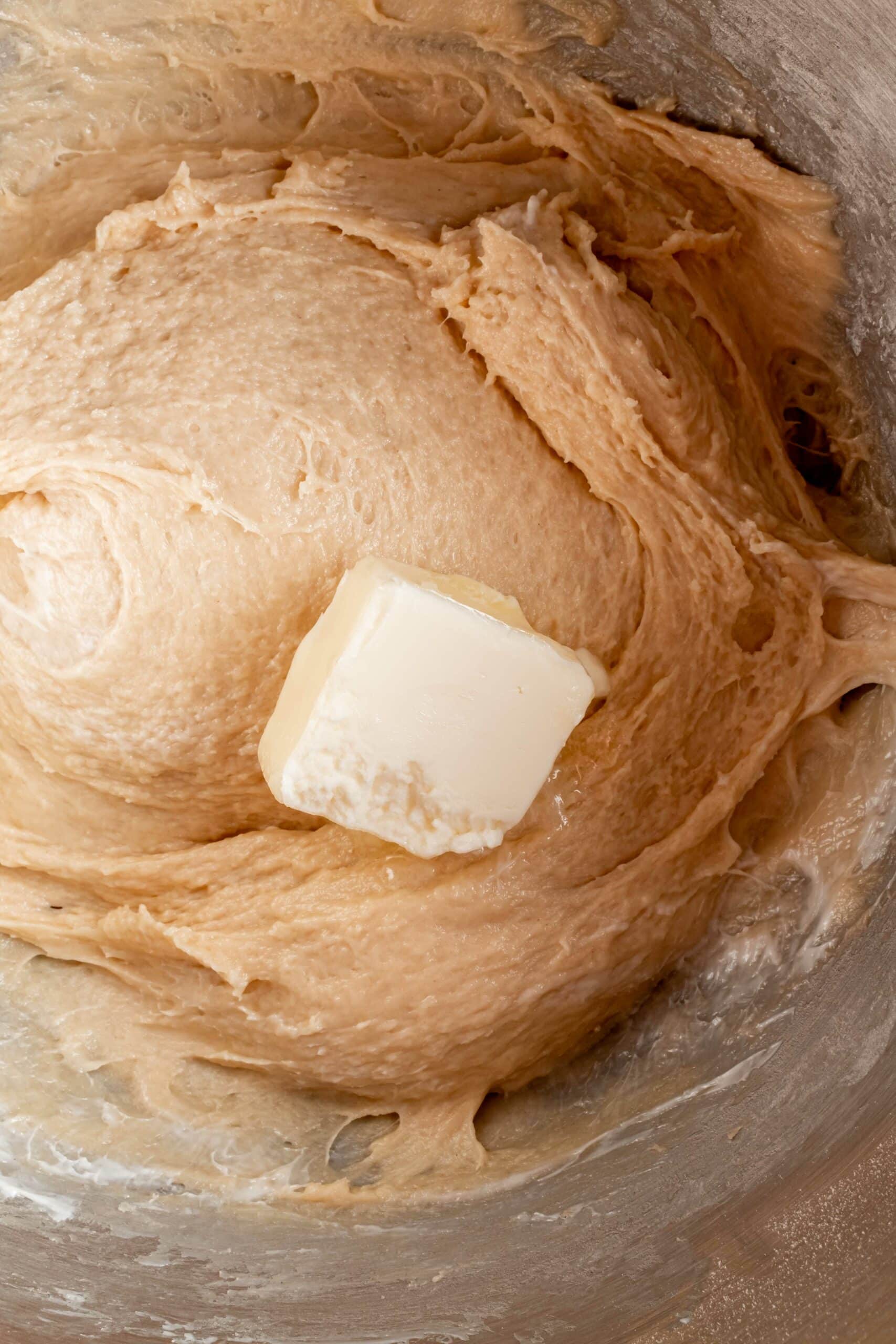 mixing butter into dough