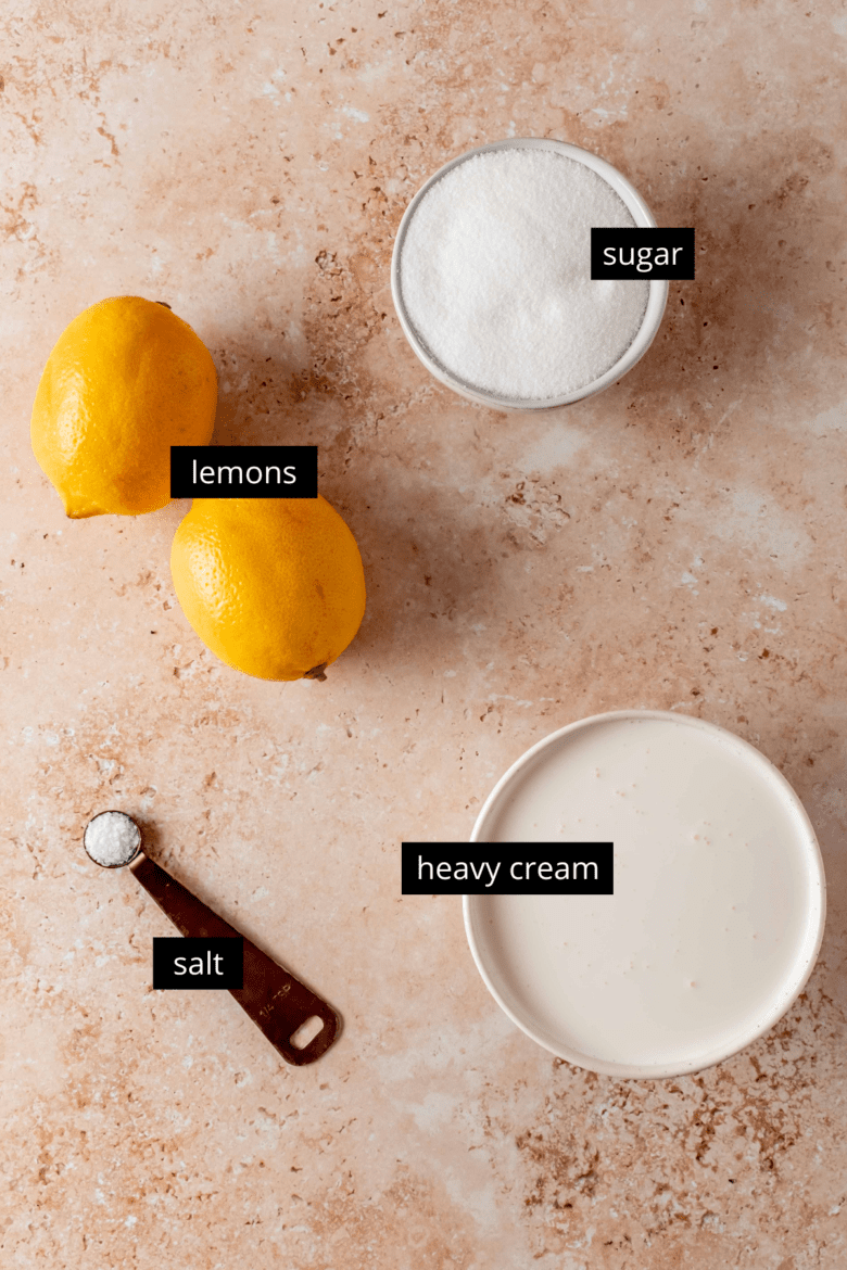Four ingredients for lemon possets: lemons, sugar, heavy cream and salt