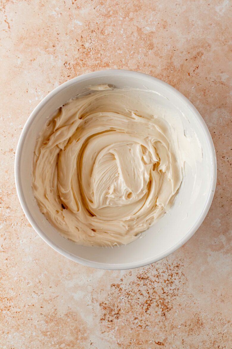 Cream cheese frosting in bowl