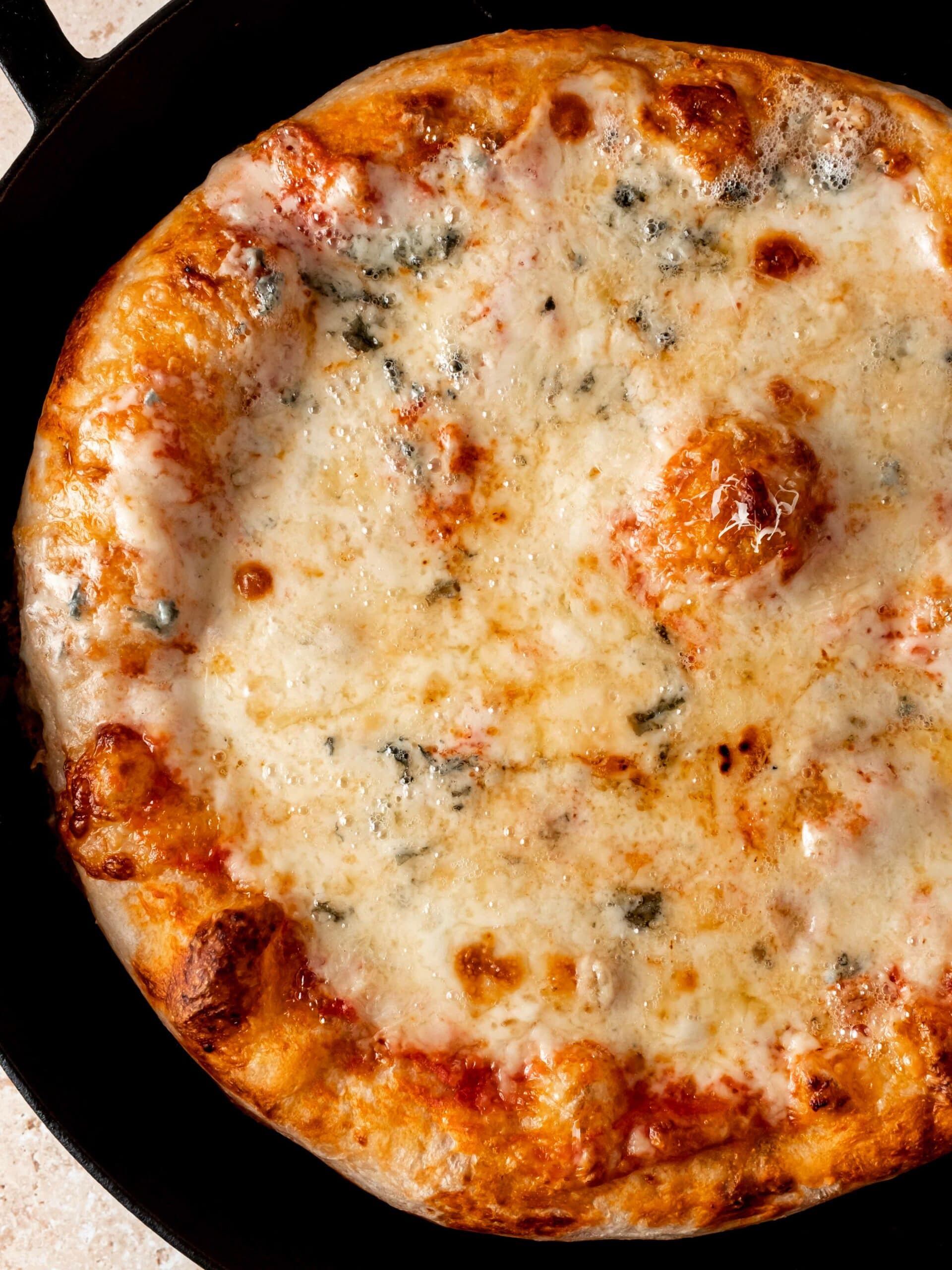 Cast Iron Pizza (on the grill or in the oven) - Whisked Away Kitchen