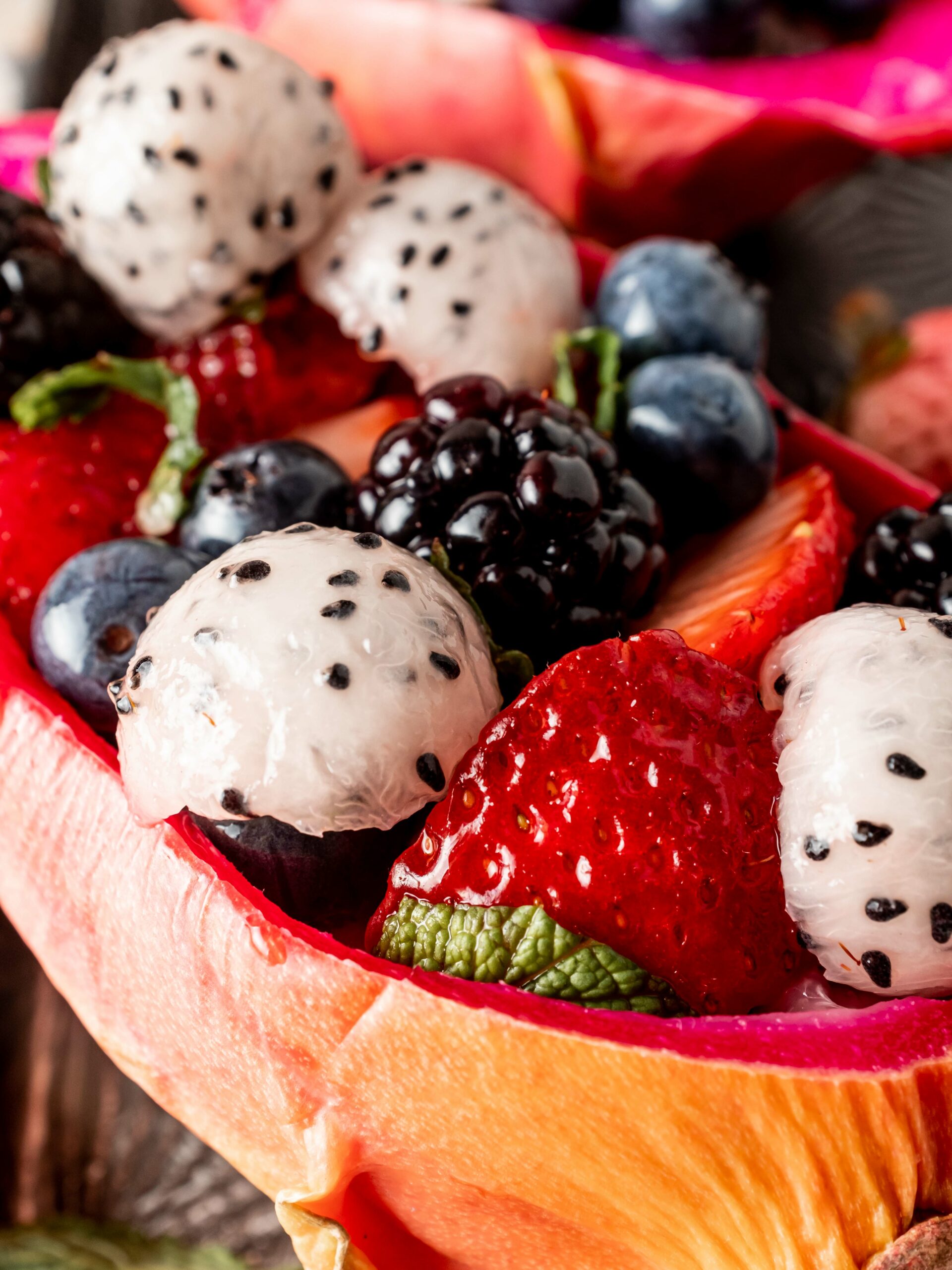 Using dragon fruit as a bowl for fruit salad