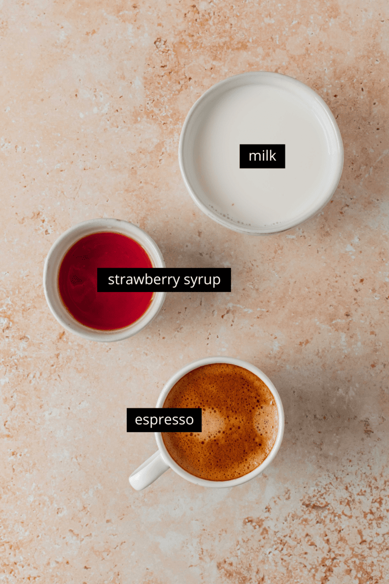 milk, strawberry syrup and espresso to make strawberry coffee