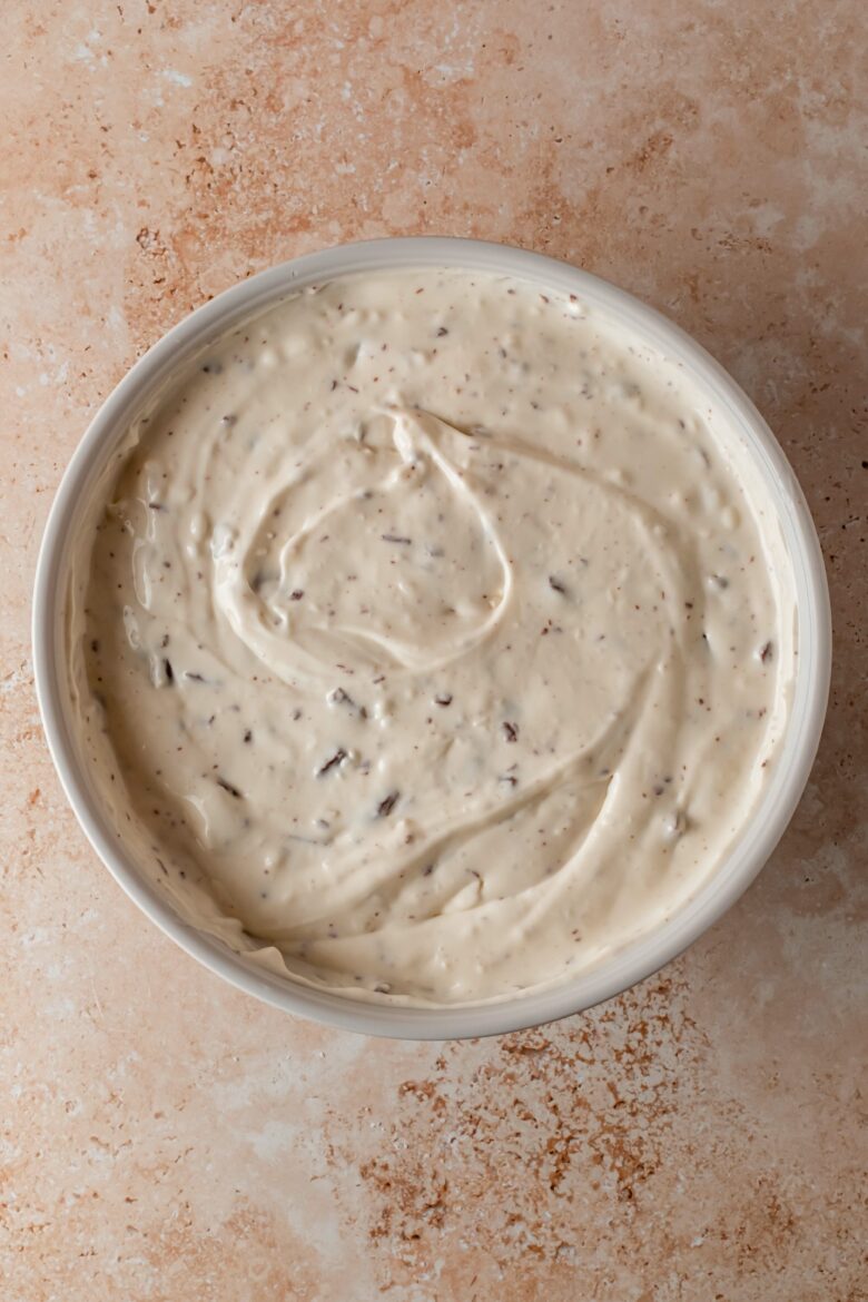 mixed cheesecake batter in bowl