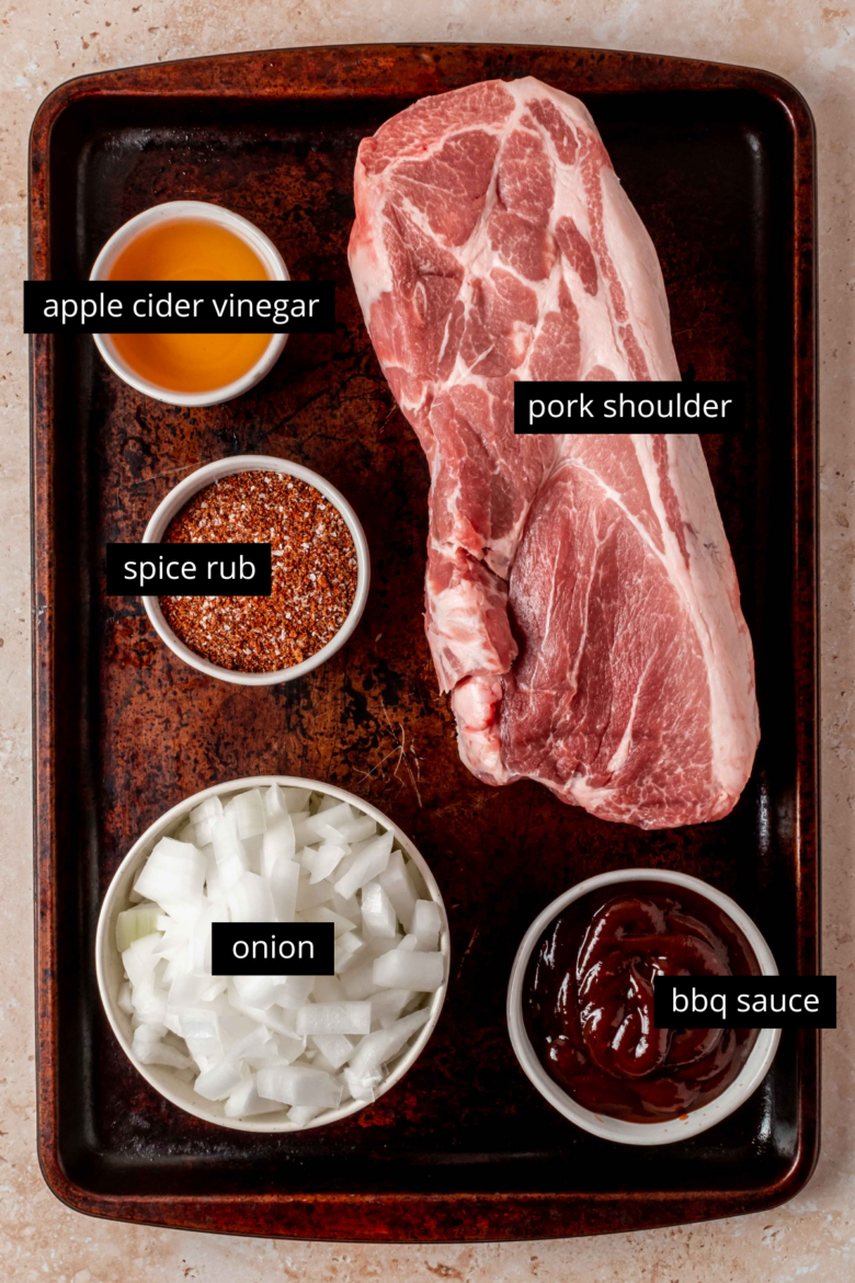 Ingredients to make pulled pork in a crockpot with pork shoulder