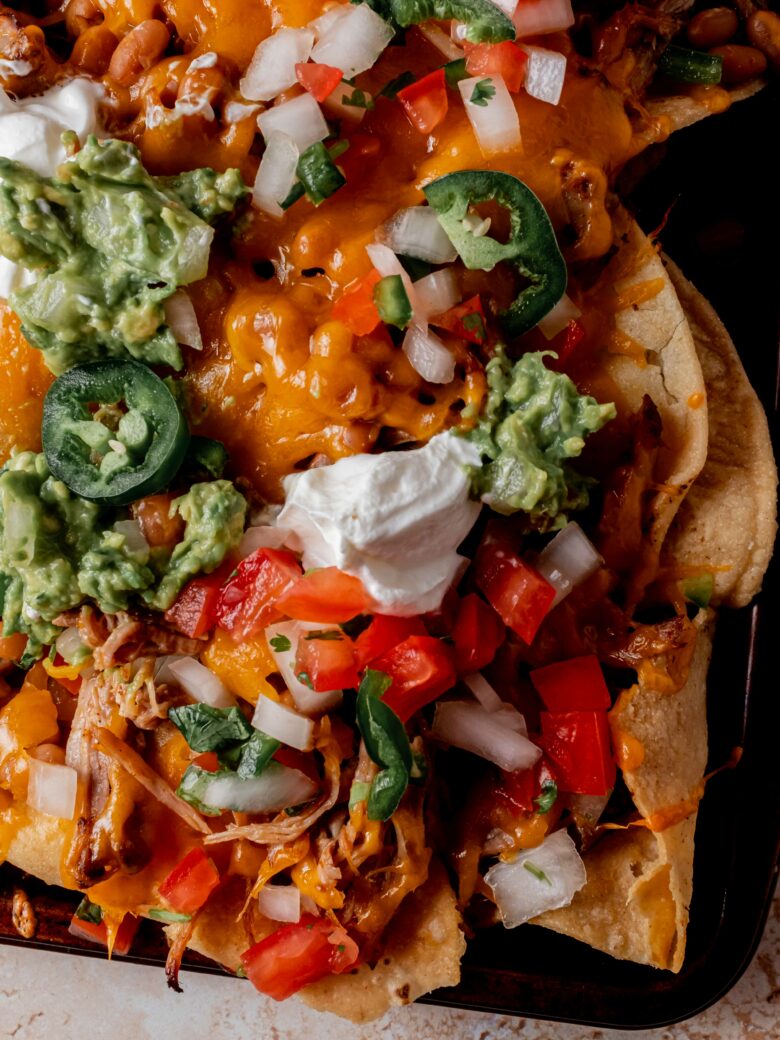 Nachos loaded with pico de gallo, guacamole and sour cream