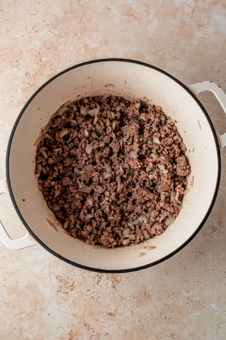 Browning ground beef for the filling.