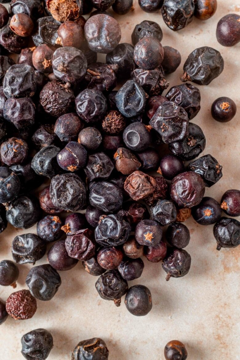 Whole dried juniper berries.