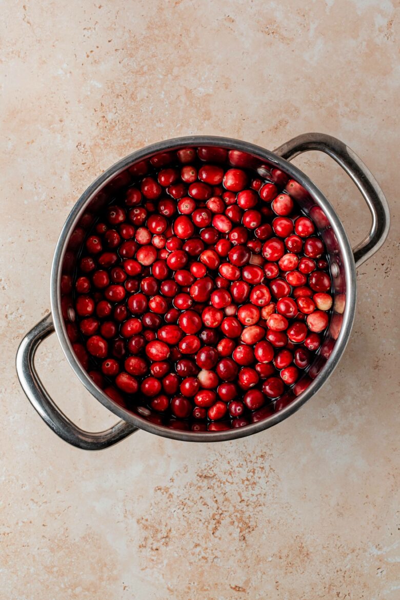 Cranberries in a saucepan.