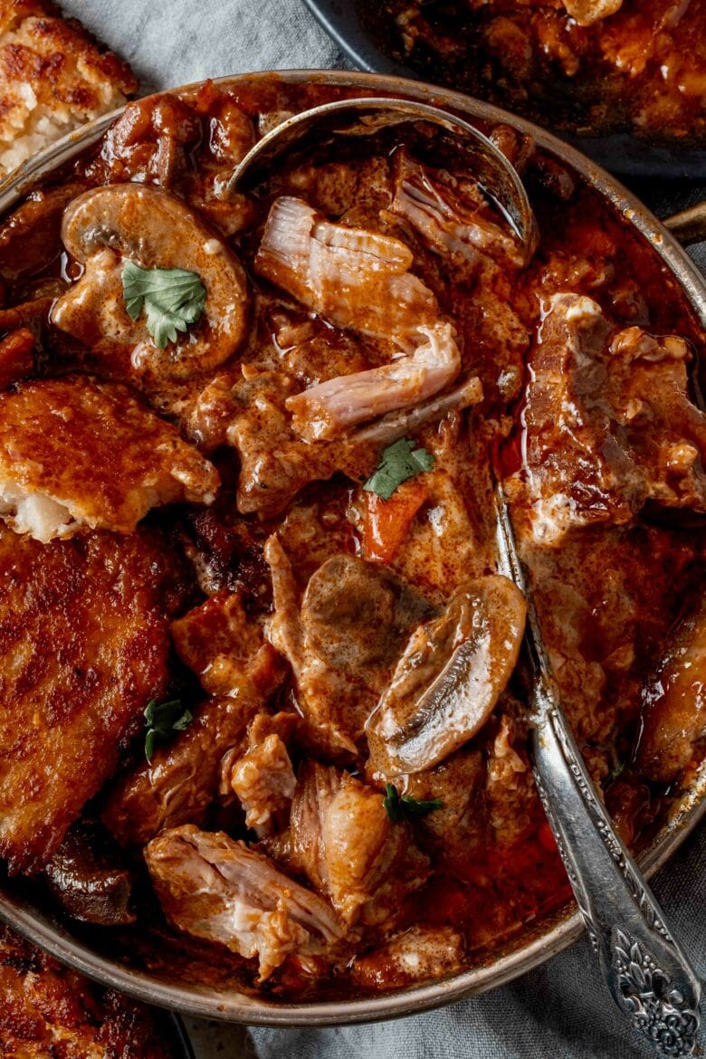 Tender pieces of pork with mushrooms and bell peppers in a hearty goulash sauce.
