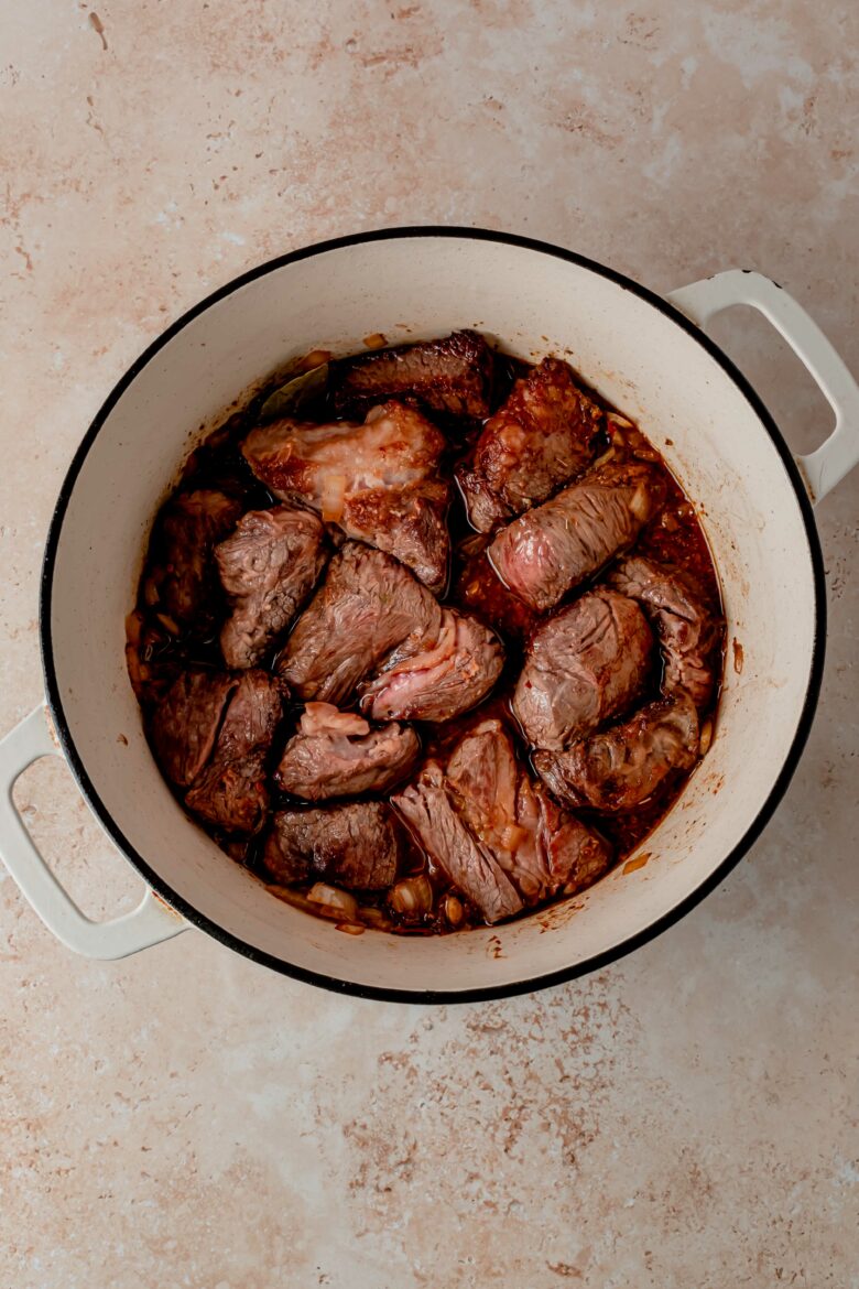 All ingredients for barbacoa in dutch oven before cooking.