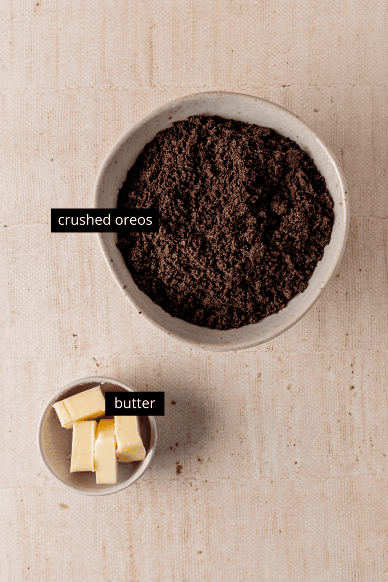 Crushed Oreo cookies and butter to make crust.