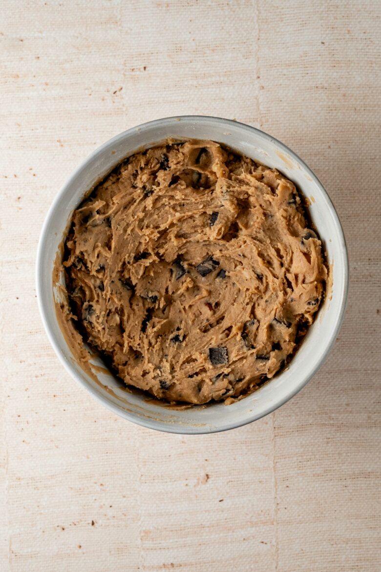 Cookie dough in mixing bowl after resting.