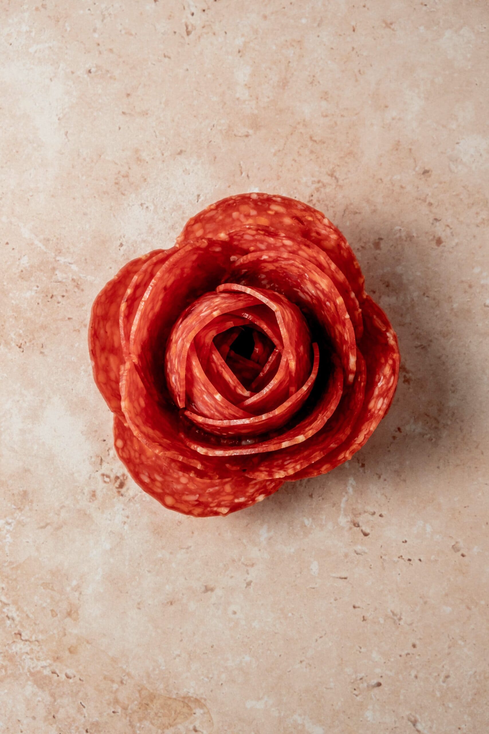 Formed salami rose.