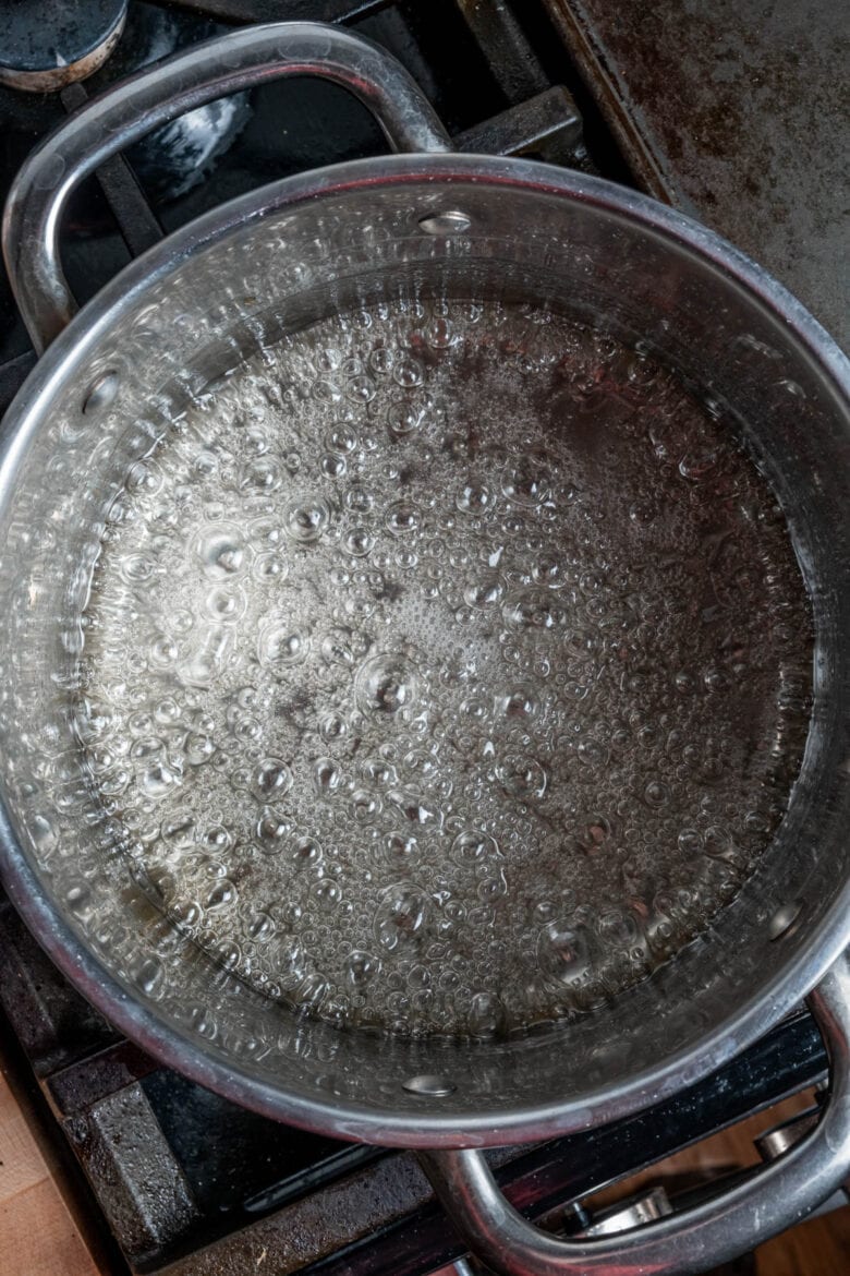 Sugar water boiling on stovetop.