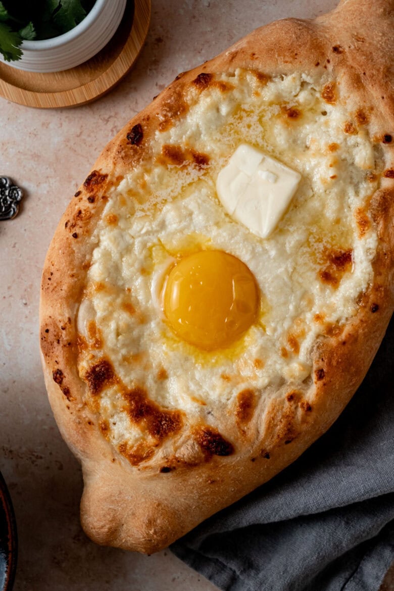 Georgian cheese bread with egg yolk and butter.