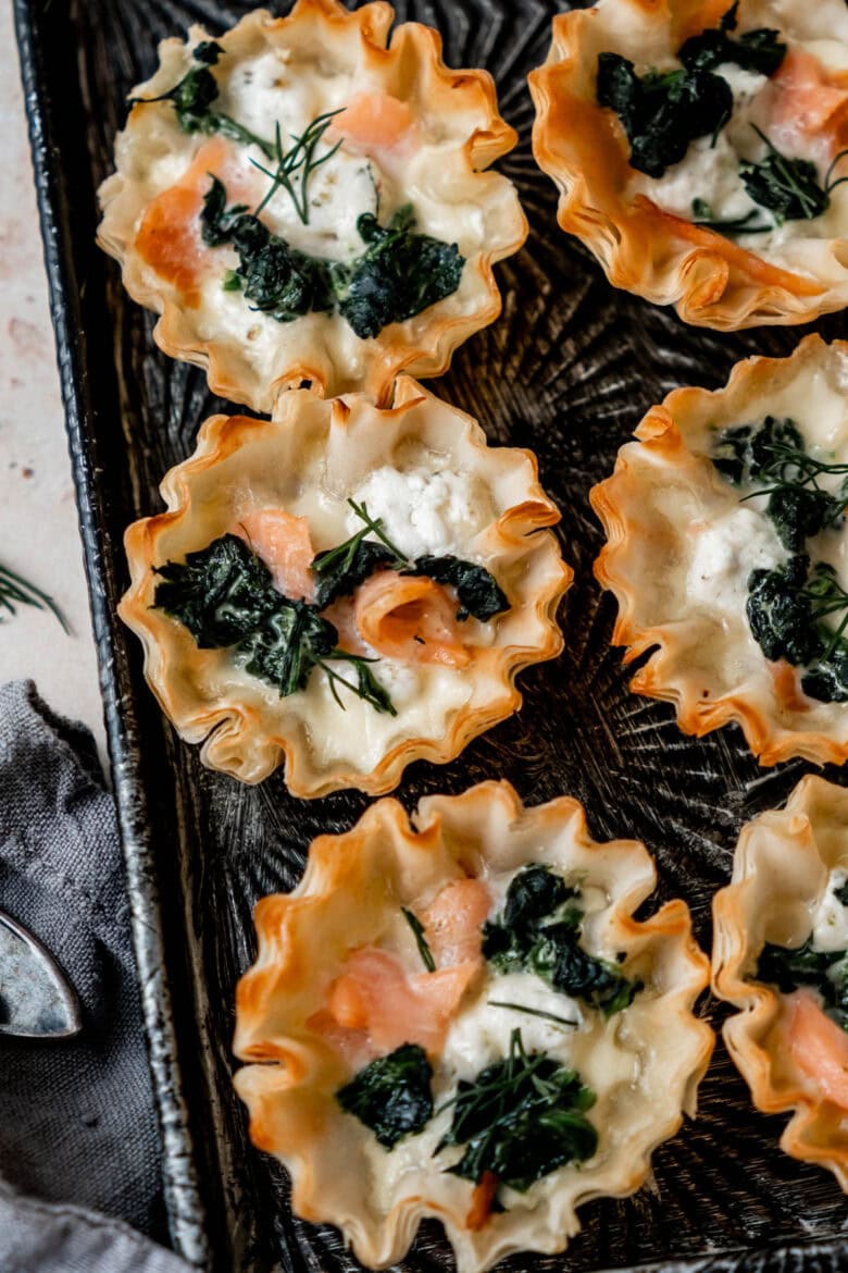 Fillo shells baked with creamy mixture of goat cheese, smoked salmon and spinach.